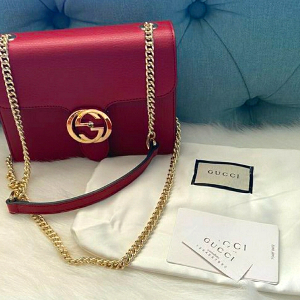Red Gucci interlocking S bag...